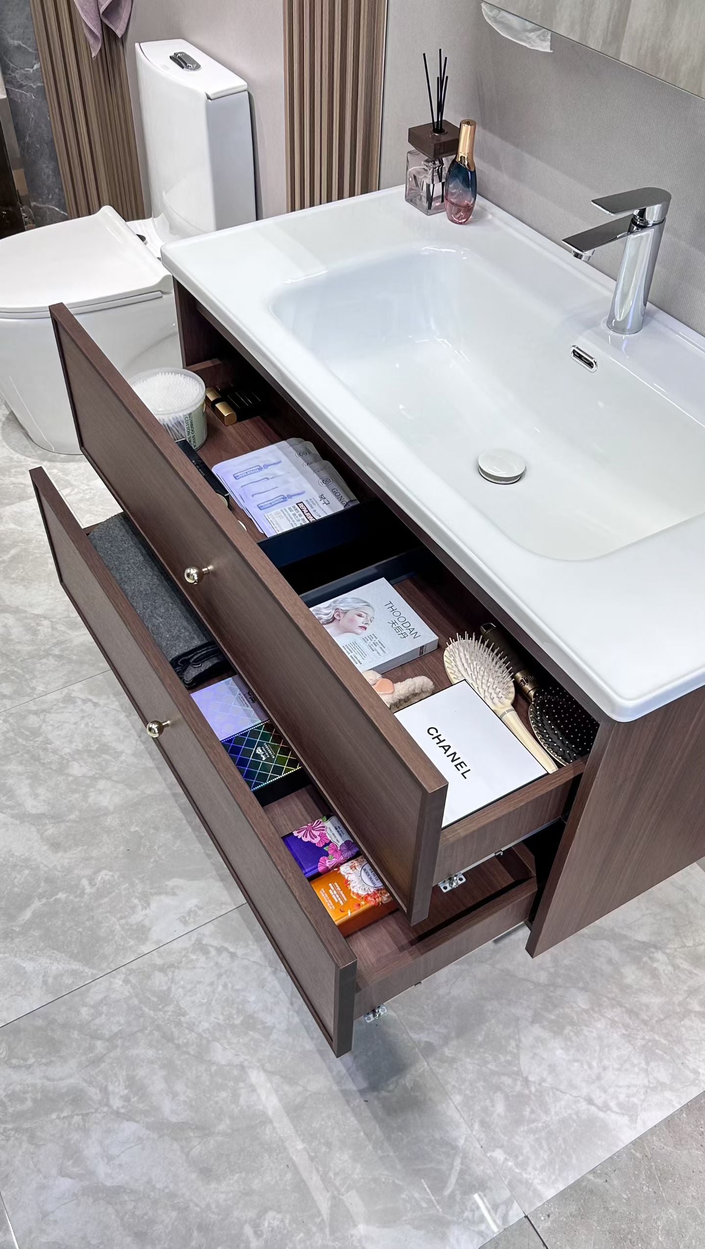 A luxurious solid wood bathroom cabinet with a walnut finish, a washbasin, and an integrated stone slab – an eco-friendly bathroom cabinet.