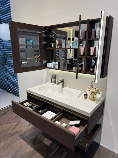 Custom-made cabinet made of red oak, hotel-style custom bathroom vanity, wash basin, and integrated stone slab with seamless design.