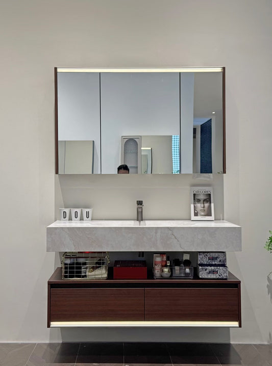 The hotel-style bathroom cabinet features a walnut veneer finish, a high-temperature stone slab integrated ceramic basin, and a washbasin.