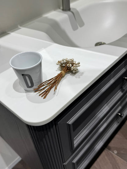 Custom-made solid wood bathroom cabinet with high-temperature stone slab, ceramic, and seamless sink made from eco-friendly materials.