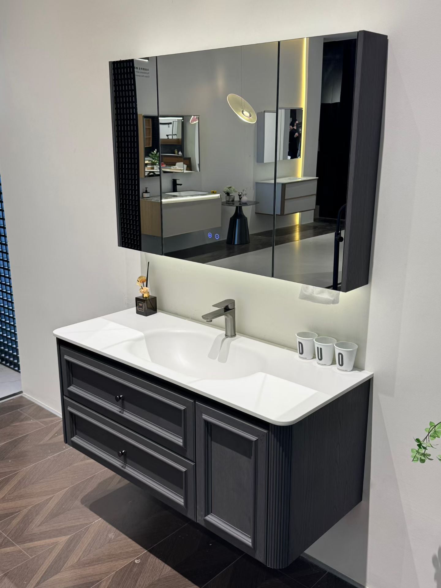 Custom-made solid wood bathroom cabinet with high-temperature stone slab, ceramic, and seamless sink made from eco-friendly materials.