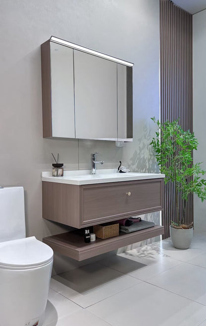 Custom-made cabinet made of red oak, hotel-style custom bathroom vanity, wash basin, and integrated stone slab with seamless design